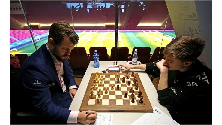 Magnus Carlsen competes against Daniil Dubov in the 82nd Tata Steel Chess Tournament