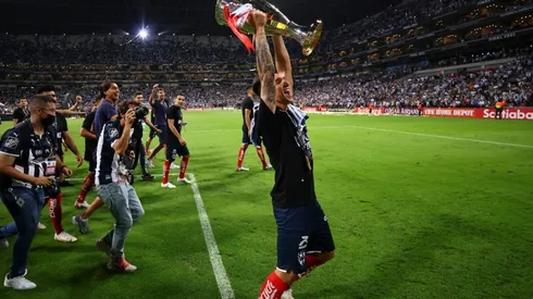 Claudio Kranevitter of Monterrey celebrates with the champions trophy