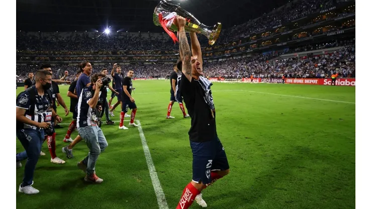 Claudio Kranevitter of Monterrey celebrates with the champions trophy