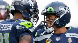 Seattle Seahawks players Adrian Peterson (left) and Russell Wilson