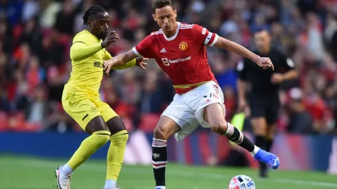 Tarique Fosu-Henry of Brentford (left) tries to block Nemanja Matic of Manchester United
