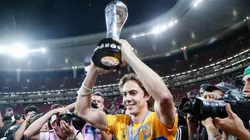 Francisco Córdova of Tigres lifts the champions trophy in 2023.