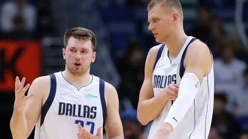 Dallas Mavericks' Luka Doncic (left) and Kristaps Porzingis.