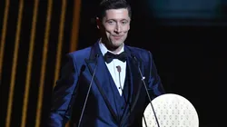 Robert Lewandowski receiving the Striker of the Year award in the 2021 Ballon d'Or ceremony.