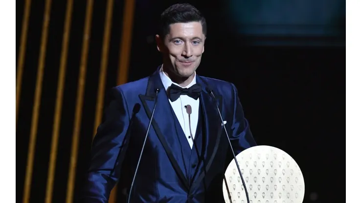 Robert Lewandowski receiving the Striker of the Year award in the 2021 Ballon d'Or ceremony.
