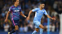 Yussuf Poulsen of RB Leipzig (left) tries to stop Riyad Mahrez of Manchester City