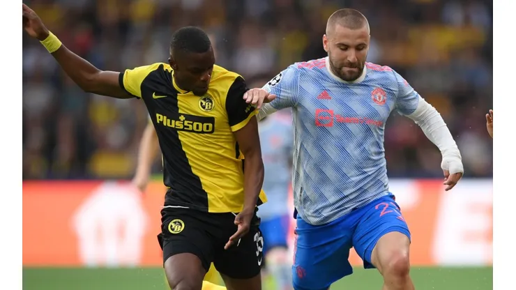 Luke Shaw of Manchester United (right) and Christopher Martins Pereira of Young Boys (left)