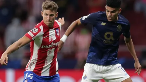 Karim Benzema of Real Madrid (left) competes with Alessandro Bastoni of Inter (right)