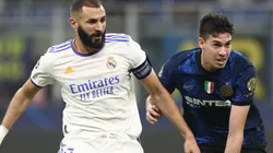 Karim Benzema of Real Madrid (left) competes with Alessandro Bastoni of Inter (right)
