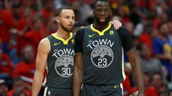Stephen Curry (left) and Draymond Green in action for the Golden State Warriors.