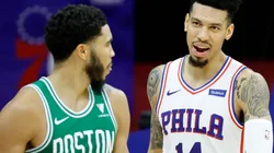 Jayson Tatum of Celtics (left) exchange words after a play with Danny Green of 76ers