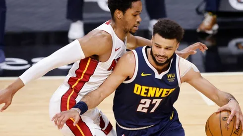 KZ Okpala of Miami Heat (left) tries to block Jamal Murray of Denver Nuggets