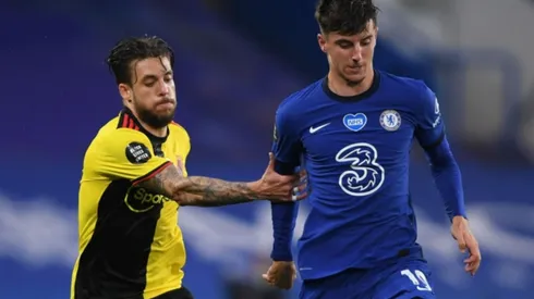 Kiko Femenia of Watford (left) fights for ball control against Mason Mount of Chelsea by Mike Hewitt