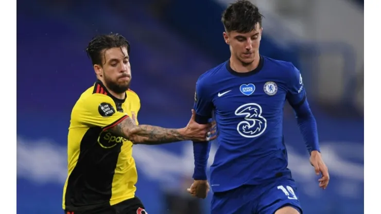Kiko Femenia of Watford (left) fights for ball control against Mason Mount of Chelsea by Mike Hewitt