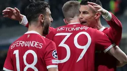 Manchester United players celebrate after scoring a goal