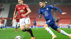 Harry Maguire of Manchester United battles for possession with Christian Pulisic of Chelsea.