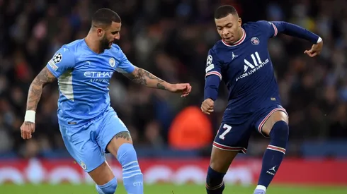 Kyle Walker of Manchester City and Kylian Mbappe of PSG