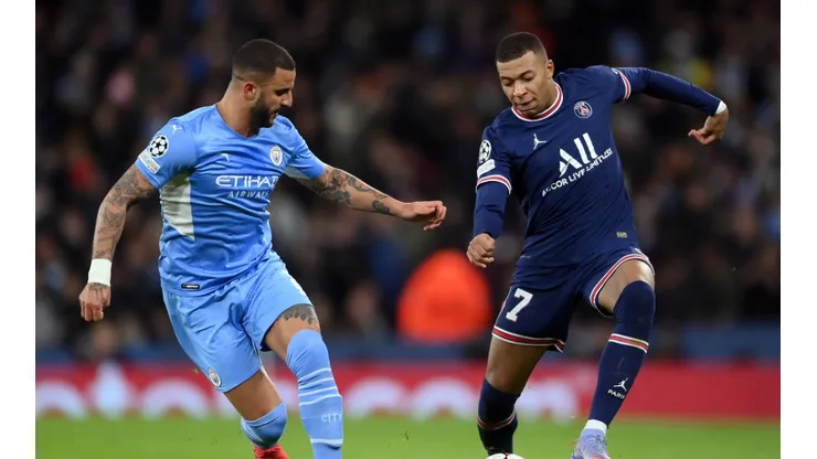 Kyle Walker of Manchester City and Kylian Mbappe of PSG