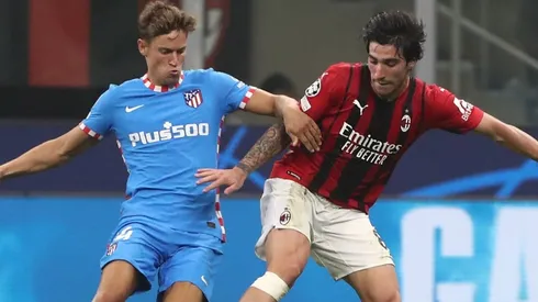 Marcos Llorente of Atletico Madrid (left) and Sandro Tonelli of Milan