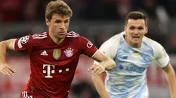 Thomas Mullers of Bayern Munich (left) tries to avoid defender Oleksandr Andriyevskiy of Dynamo Kyiv