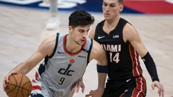 Deni Avdija of Washington Wizards (left) tries to avoid Tyler Herro of Miami Heat