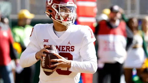 Caleb Williams #13 of the Oklahoma Sooners looks to throw against the Baylor Bears