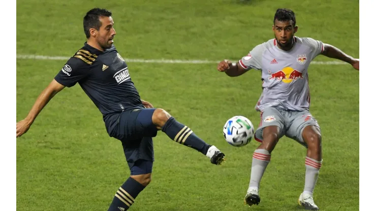 Ilsinho of Philadelphia Union (left) against Cristian Casseres Jr of New York Red Bulls.