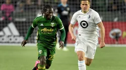 Yimmi Chara of Portland Timbers (left) against Robin Lod of Minnesota United.
