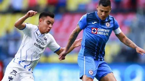 Carlos Rodriguez of Monterrey (left) against Julio Cesar Dominguez of Cruz Azul.