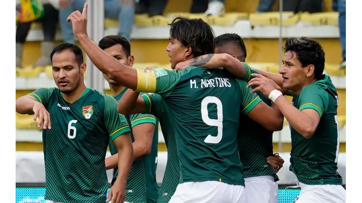 Bolivia players celebrate.