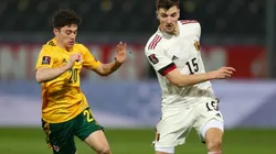 Thomas Meunier of Belgium (left) tries to avoid defender Daniel James of Wales