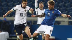 Ciro Immobile of Italy (right) and Craig Cathcart of Northern Ireland (left)