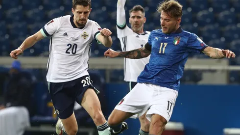 Ciro Immobile of Italy (right) and Craig Cathcart of Northern Ireland (left)