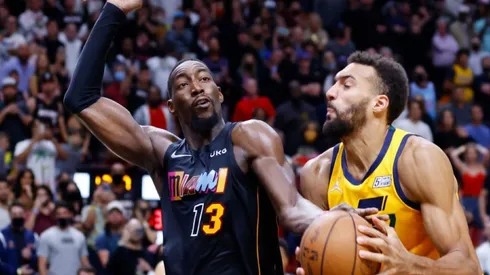 Bam Adebayo of Miami (left) tries to stop Rudy Gobert of Utah