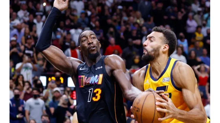 Bam Adebayo of Miami (left) tries to stop Rudy Gobert of Utah