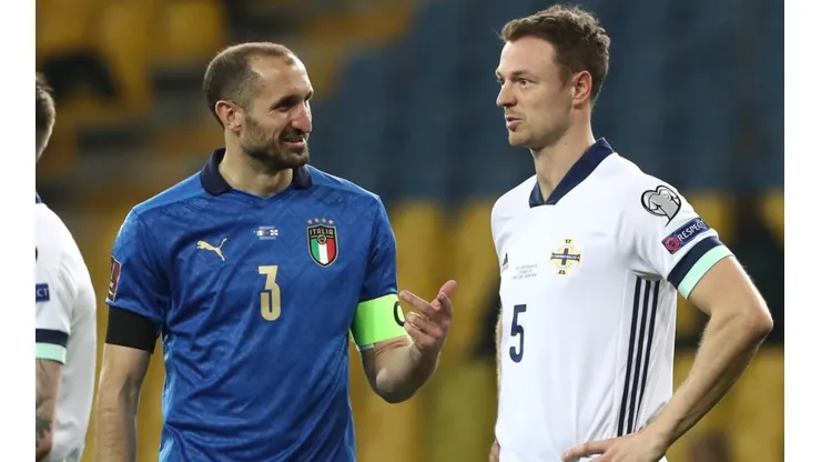 Giorgio Chiellini of Italy (left) and Jonny Evans of Northern Ireland (right)