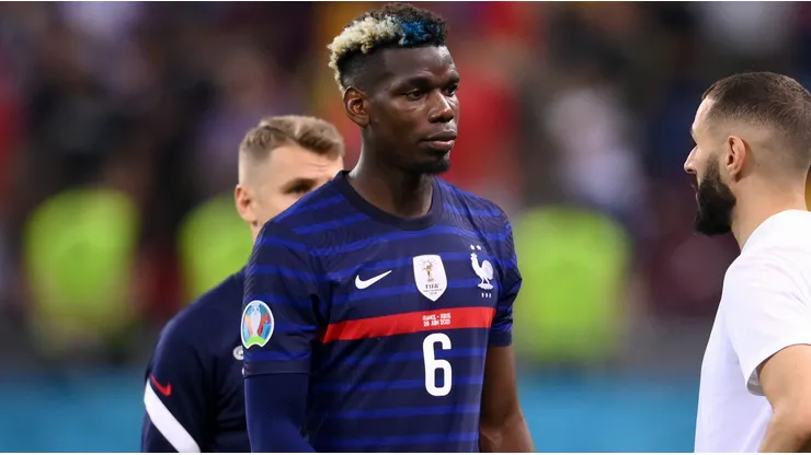 Paul Pogba of France looks dejected