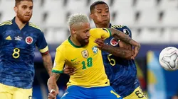 Neymar Jr. of Brazil fights for the ball with Wilmar Barrios of Colombia.