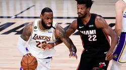 LeBron James of Los Angeles Lakers (left) tries to pass drible Jimmy Butler of the Miami Heat during the 2020 NBA Finals