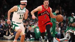 Payton Pritchard of the Boston Celtics (left) tries to stop Goran Dragic of the Raptors