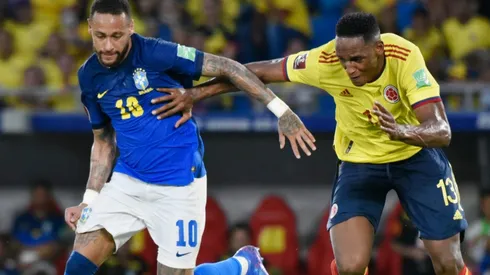 Neymar of Brazil (left) against Yerry Mina of Colombia.
