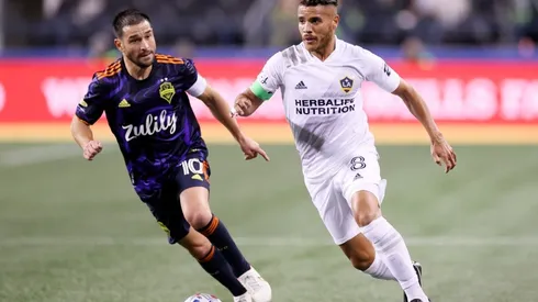 Jonathan dos Santos #8 of Los Angeles FC in action against Nicolas Lodeiro #10 of Seattle Sounders