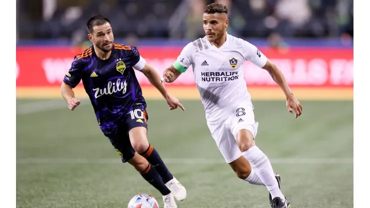 Jonathan dos Santos #8 of Los Angeles FC in action against Nicolas Lodeiro #10 of Seattle Sounders