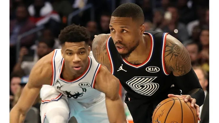 Giannis Antetokounmpo (left) and Damian Lillard in action during the 2019 NBA All-Star Game.