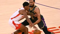 Jae'Sean Tate of Rockets (left) and Talen Horton-Tucker of Lakers