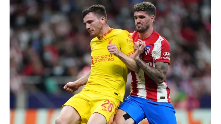 Andrew Robertson of Liverpool (left) and Rodrigo De Paul of Atletico Madrid (right)