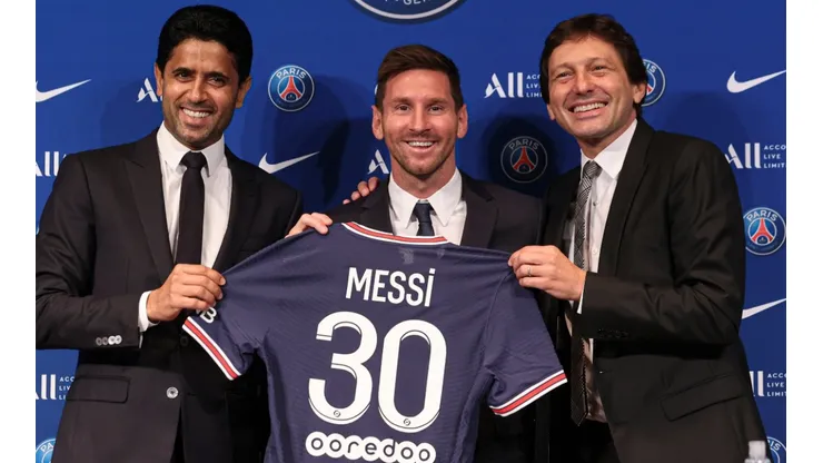 Lionel Messi (center) and Leonardo (right)