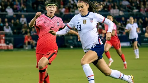 Lim Seonjoo #6 of Korea Republic fends off Alex Morgan #13 of United States
