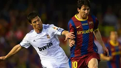 Xabi Alonso (left) and Lionel Messi during a Copa del Rey final between Real Madrid and Barcelona at Estadio Mestalla in Valencia.