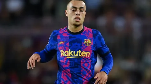 Sergiño Dest of Barcelona runs with the ball